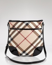 An iconic crossbody bag from Burberry in a compact and effortless style.
