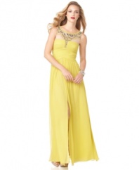 BCBGMAXAZRIA's radiant evening gown is crafted of a luxurious silk and bedecked with brilliant beading at the neckline and chest. The flowing, feminine silhouette is flattering on almost every figure.