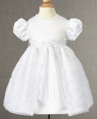 No reason to be camera shy. Her beauty will blossom in this embellished christening dress from Lauren Madison.