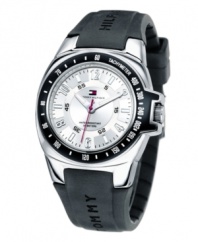 The classic American style of Tommy Hilfiger with a sporty sensibility. With black rubber strap and silver dial.