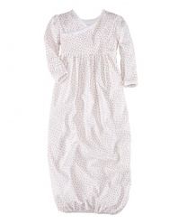 An adorable long-sleeved gown is rendered in soft cotton jersey in a sweet floral print.
