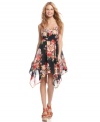 Be pretty in print with this American Rag dress that boasts gorgeous flowers everywhere and a flowy handkerchief hem!