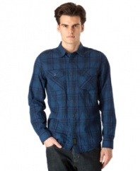Bring a little more color into your life with this saturated plaid shirt from Calvin Klein Jeans.
