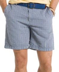 Go prepster in plaid with these comfortable flat-front seersucker shorts from Izod.