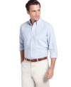 Complement your classic buttoned-up look with a striped woven shirt from Izod to create a cool, casual preppy look.