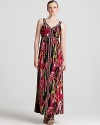 A rush of tropical florals, this Calvin Klein maxi dress blends prints big and small for the perfect fashion mash-up.