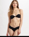 A new twist on the classic bikini, this bandeau design features feminine, twisted details and a removable halter strap for additional support. Twist-front bandeau topBack tie closureRemovable halter strapStretch bottomTwist-front waistbandFully lined86% polyamide/14% elastaneHand washImported