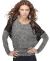 Open-stitch knit insets at the shoulder add eye-catching appeal to this otherwise simple Free People knit top!