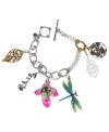 A natural wonder. Lucky Brand's unique charm bracelet combines intricate cut-out leaves and flower charms with a floral branch, a pink enamel orchid, and a teal enamel dragonfly. Setting and toggle clasp crafted in mixed metal. Approximate length: 7-3/4 inches.