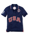 A breathable cotton mesh polo is accented with bold country embroidery, celebrating Team USA's participation in the 2012 Olympics.