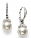 Sheer elegance. A polished simulated pearl (10 mm) adorned with crystal accents makes for divine style in Eliot Danori's dramatic drop earrings. Set in rhodium-plated mixed metal. Approximate drop: 1 inch.