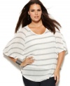 Show of your sparkle with INC's batwing sleeve plus size top, finished by metallic stripes.