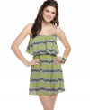 Go flirty in this day dress from Ali & Kris that sports a fun print and a ruffled overlay at the bodice!