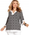 Add an elegant feel to your causal wardrobe with Charter Club's three-quarter sleeve plus size tunic top, highlighted by a vivid print. (Clearance)