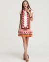 A vivid geometric print reminiscent of the '60s imbues this eye-catching Milly dress with retro panache.