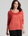 A classic scoop neck flatters the décolleté in this Eileen Fisher basic three-quarter sleeve tee--a must-have for seasonal layering.