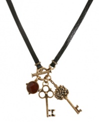 Unlock your new look! Lucky Brand's charm necklace combines two key pendants with a semi-precious carnelian stone. With a black leather strap and setting crafted from gold tone mixed metal. Approximate length: 27-1/2 inches. Approximate drop: 3 inches.