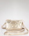 Cute and compact. Tory Burch's metallic leather crossbody is the perfect partner for the glamour girl on the go. Carry it to wear your logo love over your shoulder.