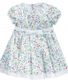 She'll be as beautiful as a bouquet in this pretty print dress from Little Me.