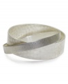 Lock in fabulous style with Jones New York's interlocked bangle. Bracelet crafted from two bands of silvertone mixed metal. Approximate diameter: 2-3/4 inches.