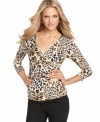 Get wild with Cable & Gauge's braided-front top! The animal print lends an on-trend touch to any outfit.