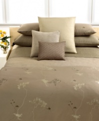 Nature inspired! This Sapling comforter from Calvin Klein Home creates a calming effect in your bedroom with muted floral designs over an earth tone landscape.