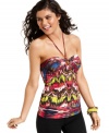 Get loud! From the hot keyhole design to the burst of bold colors, this halter top from Rampage totally pops!