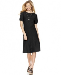 A carefree silhouette in a bold, springtime color makes this J Jones New York dress an everyday essential.