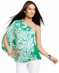 INC adds a touch of tropic-inspired glam to your closet with this one-shoulder dolman top, featuring a vibrant print and a dose of rhinestone studs.