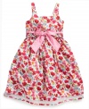 Give her the lovely look she wants with the beautiful bouquet of flowers on this floral dress from Jayne Copeland.