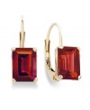 Crimson chic. Add a vibrant pop of color to your look with emerald-cut garnet (3/4 ct. t.w.) set in luminous 14k gold. Approximate drop: 1/2 inch.