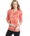 Add safari style to your springtime wardrobe with this MICHAEL Michael Kors global-inspired printed top!