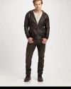 A rich leather jacket with a two-way zip front, is a definite wardrobe essential, while an attached hood lends a contemporary edge that is both rugged and refined.Two-way zip frontAttached drawstring hoodWaist slash pocketsBanded cuffs and hemAbout 26 from shoulder to hemLeatherDry cleanImported