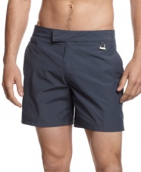 Keep it classic even in the sand. Get sunny style and comfort with these bermuda swim trunks from Calvin Klein.