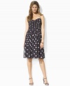 A classic polka dot print lends feminine charm to this Lauren by Ralph Lauren dress, designed from airy chiffon with a gathered bodice and a graceful full skirt for a timelessly chic look.
