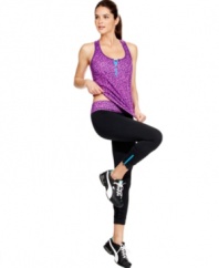 Get active in Ideology's sporty active pants, featuring a shock of color at the waistband and zippers at the hem!