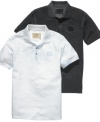 Elevate your classic polo style with this pique polo shirt from Guess.