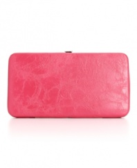 This super purse-friendly flat frame wallet by Style&co. is definitely a girl's best trend. Choose from either a vibrant textured pink or metallic snakeskin for a glam way to carry your necessities.