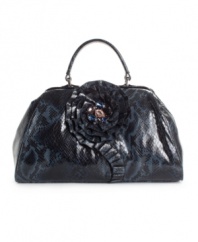A flirty ruffled rose turns the classic doctor bag into a glamorously fun bag, by Jessica Simpson.