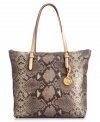 A MICHAEL Michael Kors tote covered in an exotic snakeskin print. This head-turning design is perfectly accented with gorgeous 18k gold signature hardware and a small logo at front.