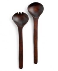Hand-carved in beautiful obeche wood, these simple servers bring rustic charm to the casual table that's straight from the heart of Haiti.