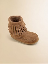 This ultra-comfortable, ultra-stylish boot is made in plush suede with a convenient side zip and layers of fringe for peace, love and fashion for your little one.Zip-upSuede upperRubber solePadded insoleImported