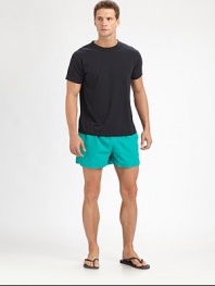 An essential for the sun-loving man, shaped in quick-drying nylon for endless summer fun this season and beyond.Elastic drawstring waistSide slash, back flap pocketInseam, about 4PolyamideMachine washImported