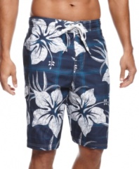 Catch the wave! You'll be ready to ride in style and comfort with these board shorts from Izod.