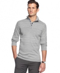 To mock is to envy. This long-sleeved shirt with mock neck collar from Calvin Klein is a polished layer for the season.
