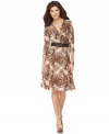 It's a wrap! Jones New York's printed dress highlights your figure with side ruching and a belted waist.