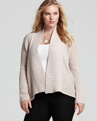 Slip on this slouchy Eileen Fisher shawl collar cardigan when you're running errands or to a meeting--the versatile and warm silhouette works well with everything from denim to a sleek pencil skirt.