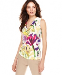 Pop your summer wardrobe with this watercolor floral-print Calvin Klein top -- perfect over any of the season's bottoms!