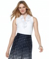 Ruffles stay chic in this simple shirt from Jones New York Signature. Pair it with a printed skirt for feminine style.