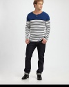 An ideal layering option season after season, shaped in a fine, soft cotton knit.Two-button placketCottonDry cleanImported